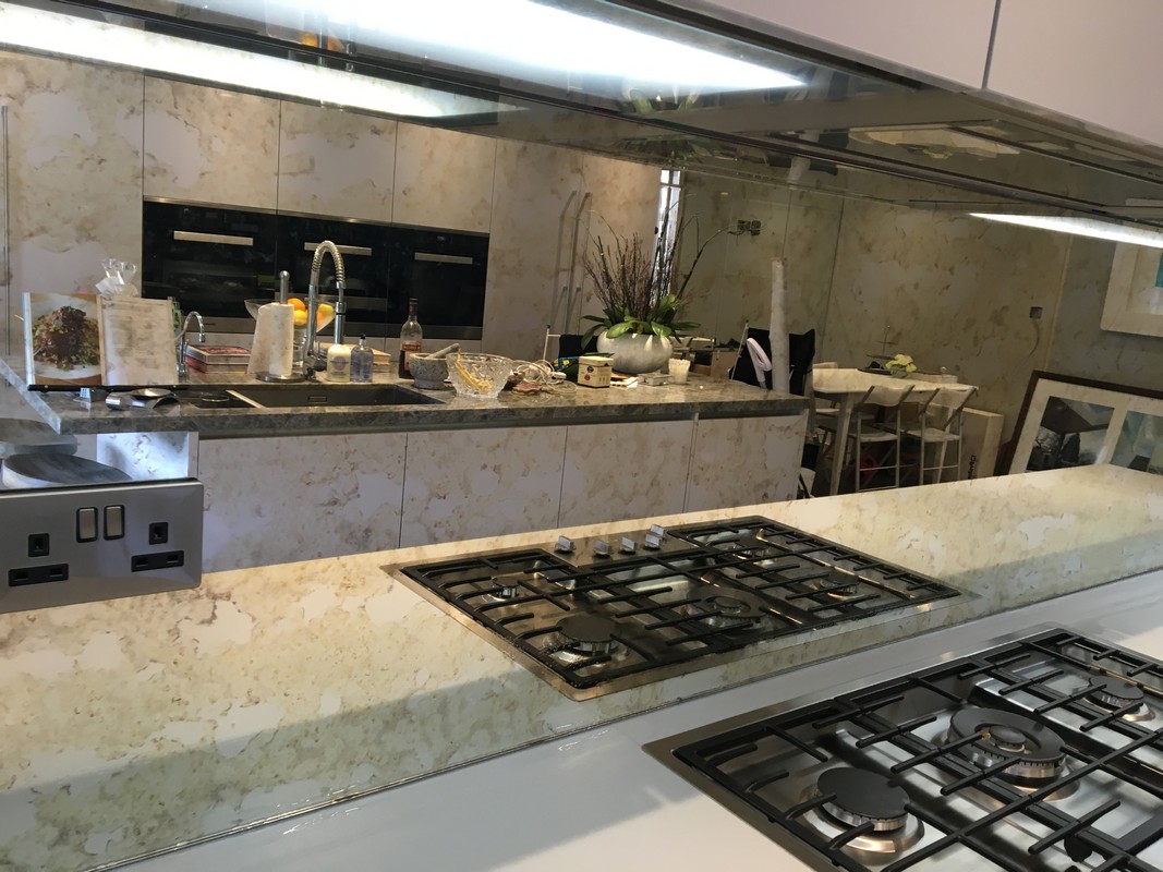 Mirror glass splashback in Amersham luxury kitchen