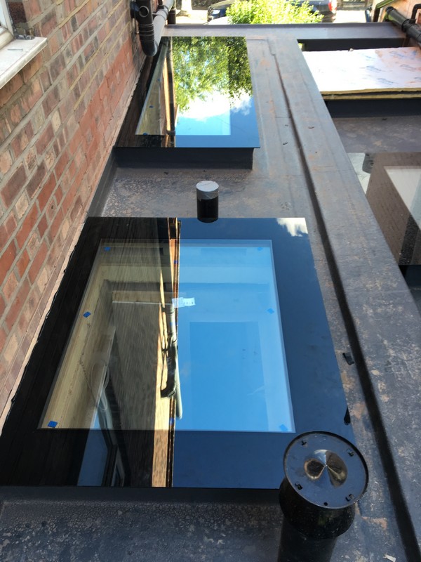 Multiple flat roof skylights on extension in Amersham